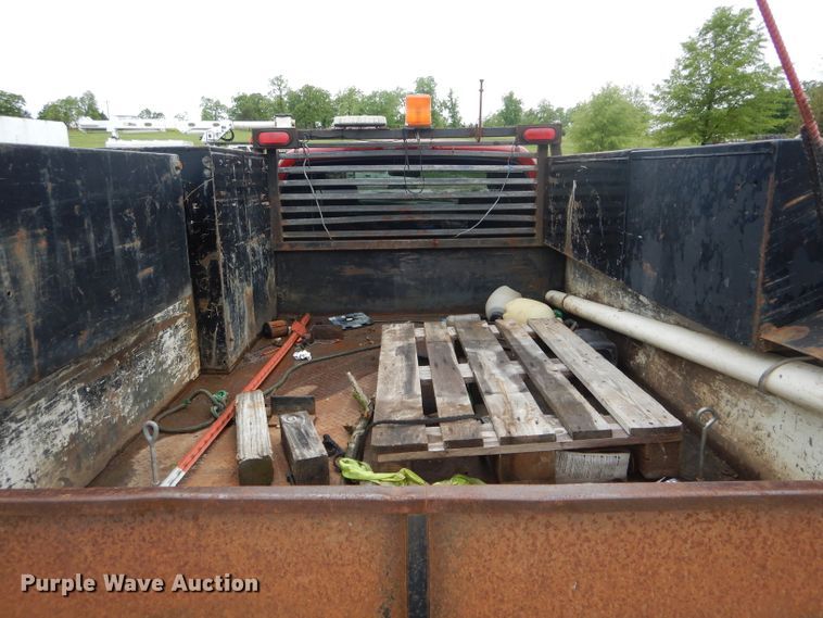 image for item GO9659 2003 Dodge Ram 3500  Quad Cab flatbed pickup truck