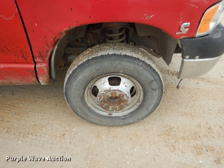 image for item GO9659 2003 Dodge Ram 3500  Quad Cab flatbed pickup truck