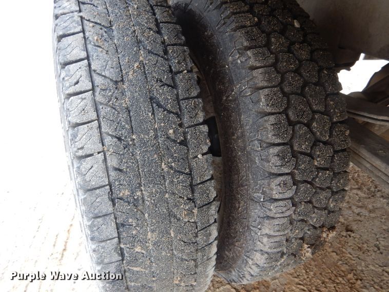 image for item GO9659 2003 Dodge Ram 3500  Quad Cab flatbed pickup truck