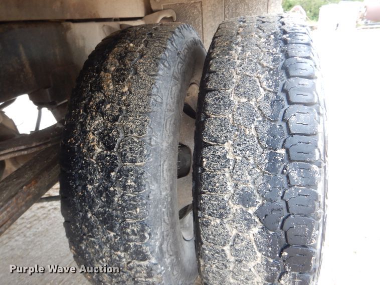 image for item GO9659 2003 Dodge Ram 3500  Quad Cab flatbed pickup truck