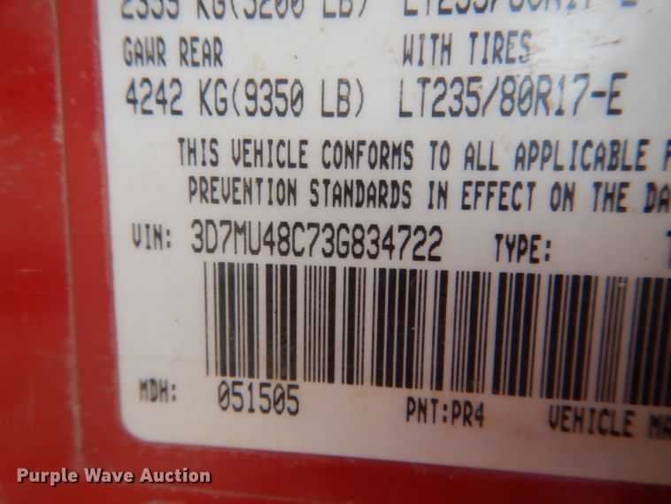 image for item GO9659 2003 Dodge Ram 3500  Quad Cab flatbed pickup truck