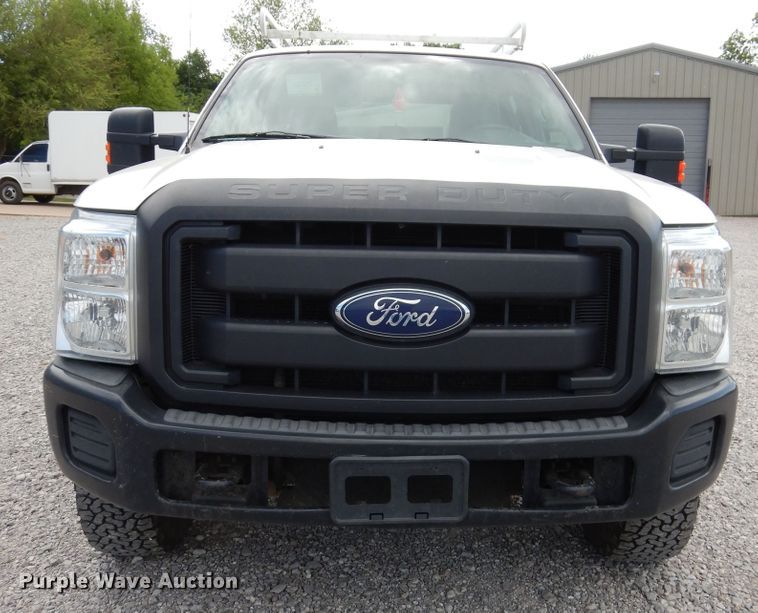 image for item HA9138 2014 Ford F250 Super Duty  Crew Cab utility bed pickup truck