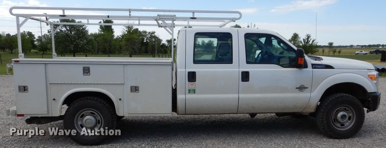 image for item HA9138 2014 Ford F250 Super Duty  Crew Cab utility bed pickup truck