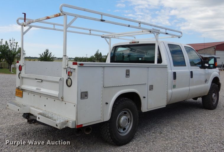 image for item HA9138 2014 Ford F250 Super Duty  Crew Cab utility bed pickup truck