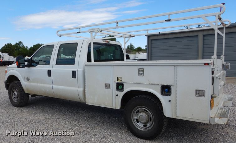 image for item HA9138 2014 Ford F250 Super Duty  Crew Cab utility bed pickup truck