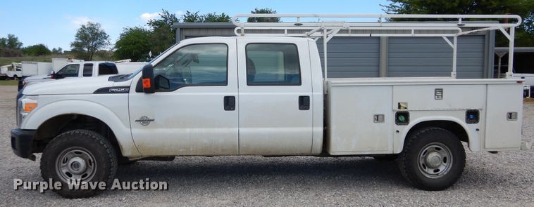 image for item HA9138 2014 Ford F250 Super Duty  Crew Cab utility bed pickup truck