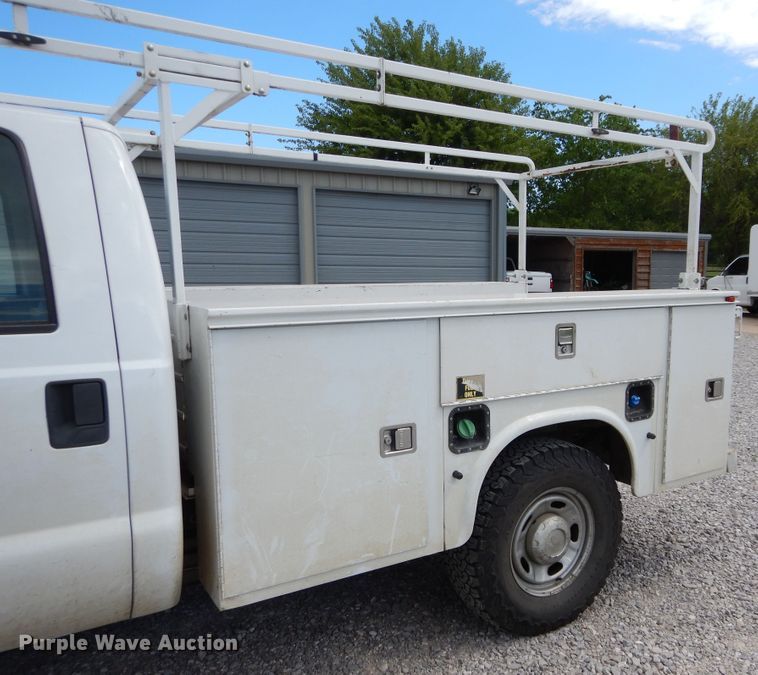 image for item HA9138 2014 Ford F250 Super Duty  Crew Cab utility bed pickup truck