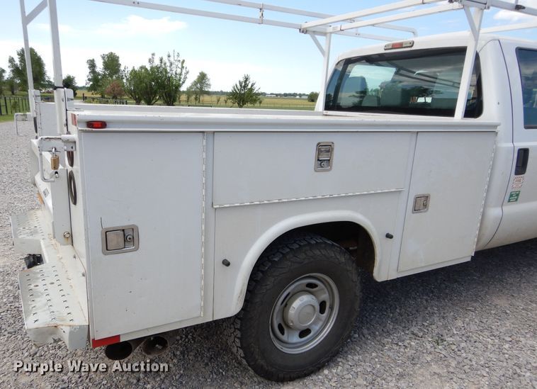 image for item HA9138 2014 Ford F250 Super Duty  Crew Cab utility bed pickup truck