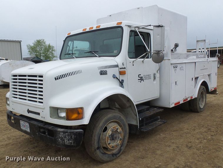image for item DG5683 1997 International 4700  utility bed truck