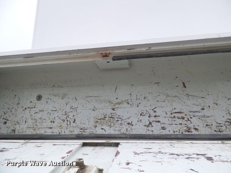 image for item DG5683 1997 International 4700  utility bed truck