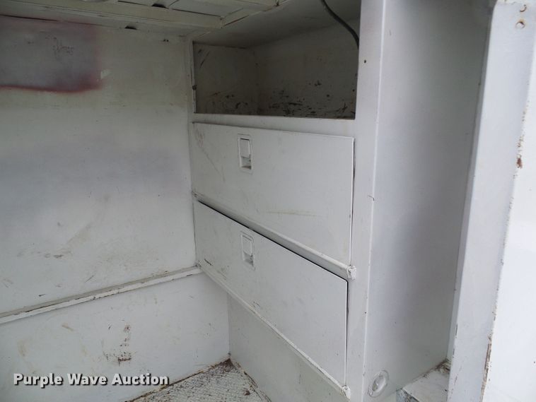 image for item DG5683 1997 International 4700  utility bed truck