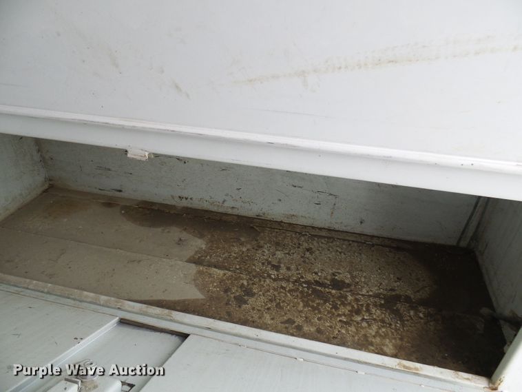 image for item DG5683 1997 International 4700  utility bed truck