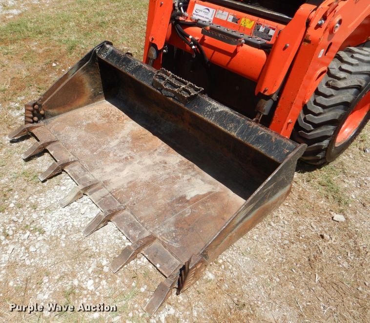 image for item DH5345 2016 Kubota SSV65  skid steer loader