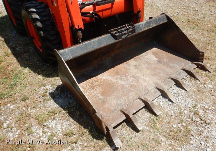 image for item DH5345 2016 Kubota SSV65  skid steer loader
