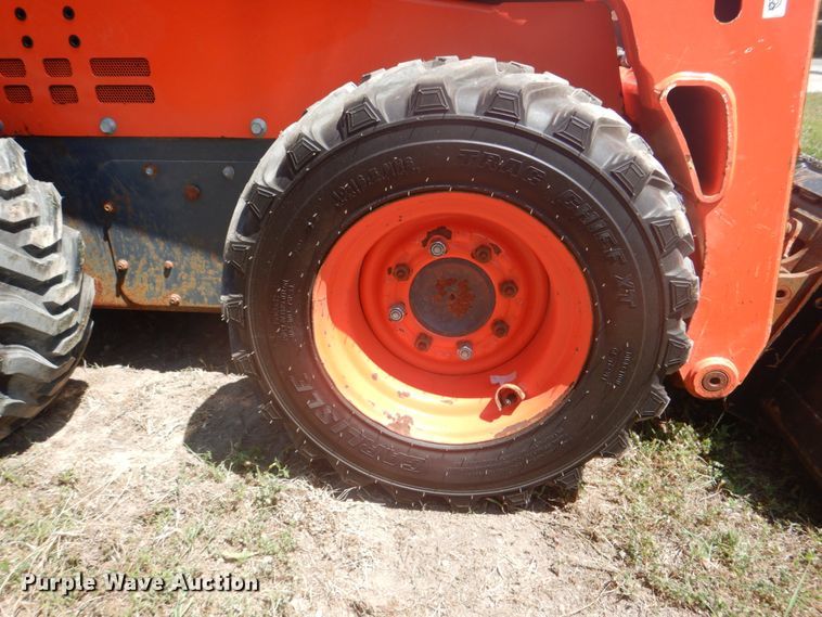 image for item DH5345 2016 Kubota SSV65  skid steer loader