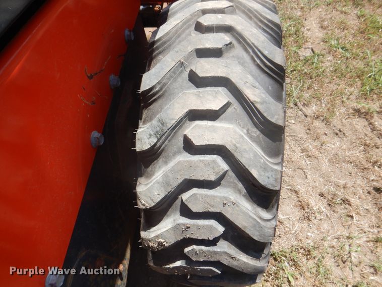 image for item DH5345 2016 Kubota SSV65  skid steer loader