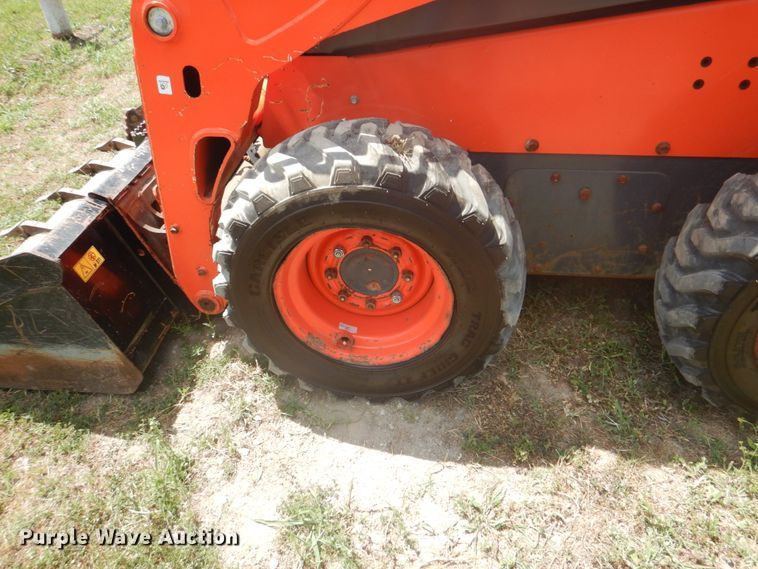 image for item DH5345 2016 Kubota SSV65  skid steer loader