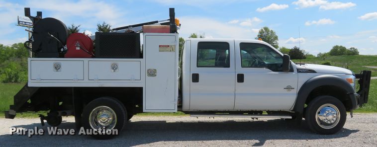 image for item DI2187 2012 Ford F550 Super Duty XL Crew Cab utility bed truck with crane