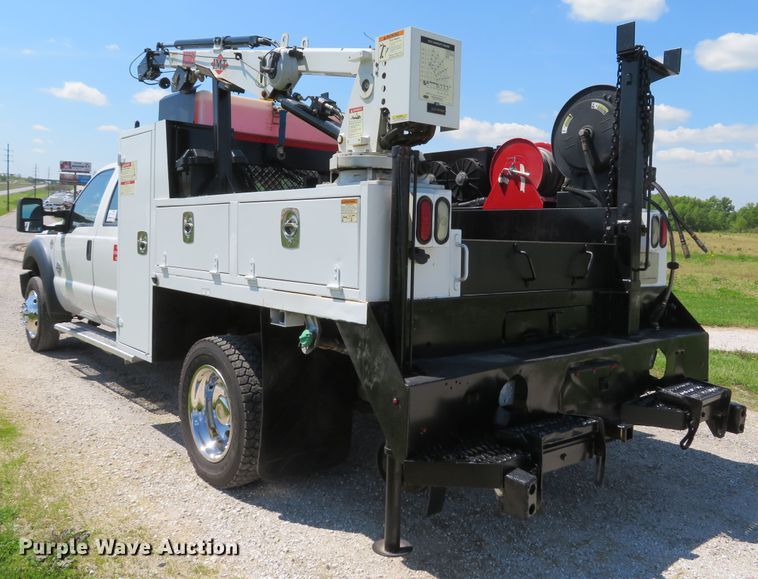 image for item DI2187 2012 Ford F550 Super Duty XL Crew Cab utility bed truck with crane