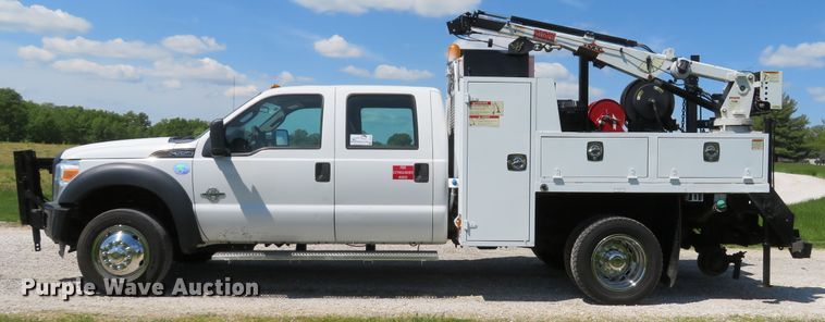 image for item DI2187 2012 Ford F550 Super Duty XL Crew Cab utility bed truck with crane