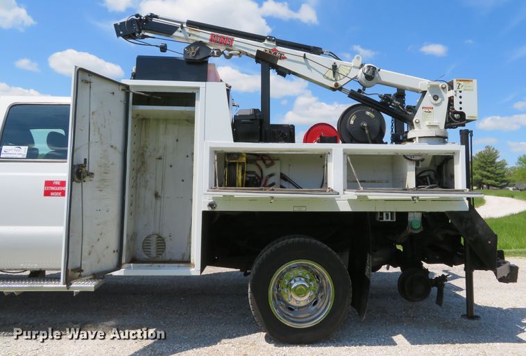 image for item DI2187 2012 Ford F550 Super Duty XL Crew Cab utility bed truck with crane