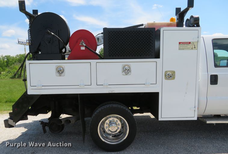 image for item DI2187 2012 Ford F550 Super Duty XL Crew Cab utility bed truck with crane