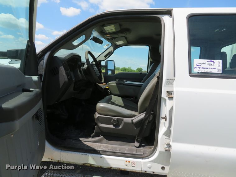 image for item DI2187 2012 Ford F550 Super Duty XL Crew Cab utility bed truck with crane