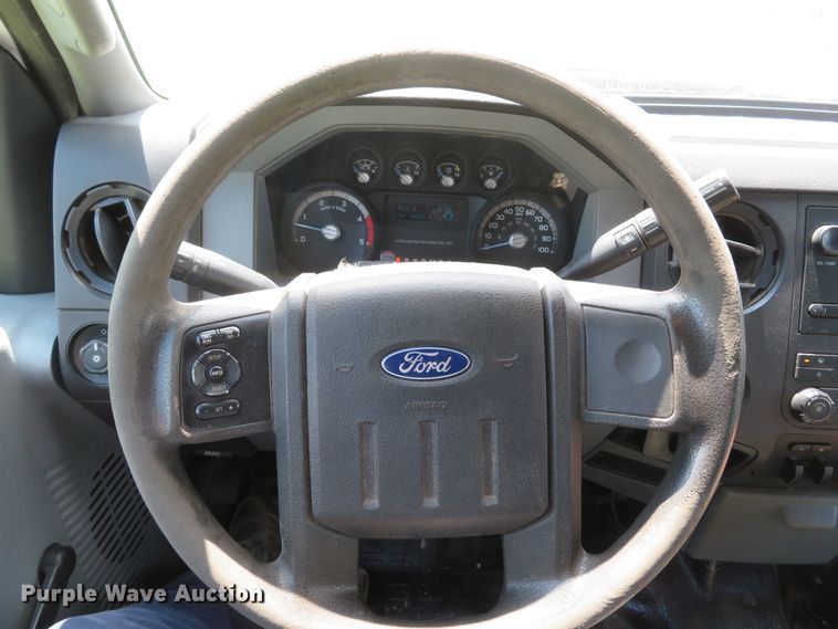 image for item DI2187 2012 Ford F550 Super Duty XL Crew Cab utility bed truck with crane