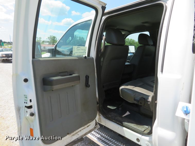 image for item DI2187 2012 Ford F550 Super Duty XL Crew Cab utility bed truck with crane