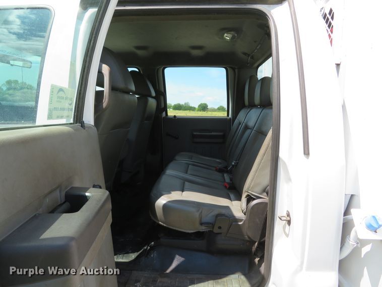 image for item DI2187 2012 Ford F550 Super Duty XL Crew Cab utility bed truck with crane