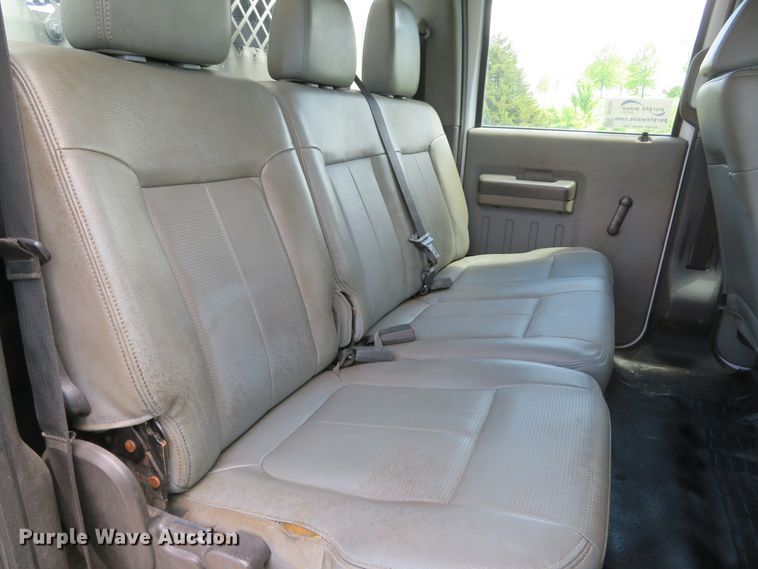 image for item DI2187 2012 Ford F550 Super Duty XL Crew Cab utility bed truck with crane