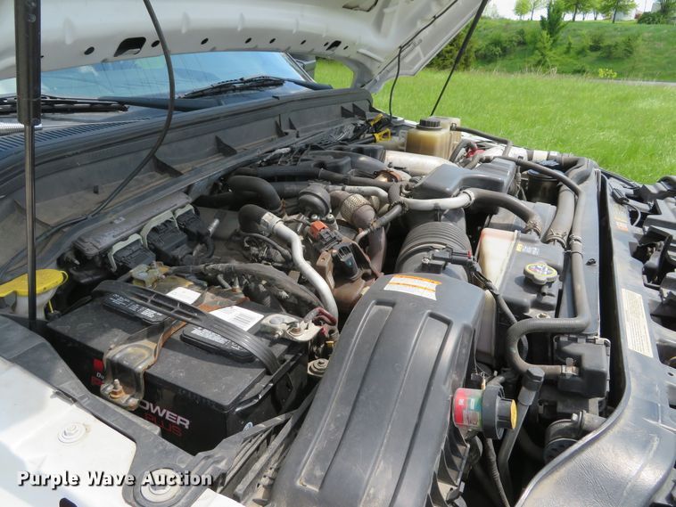 image for item DI2187 2012 Ford F550 Super Duty XL Crew Cab utility bed truck with crane