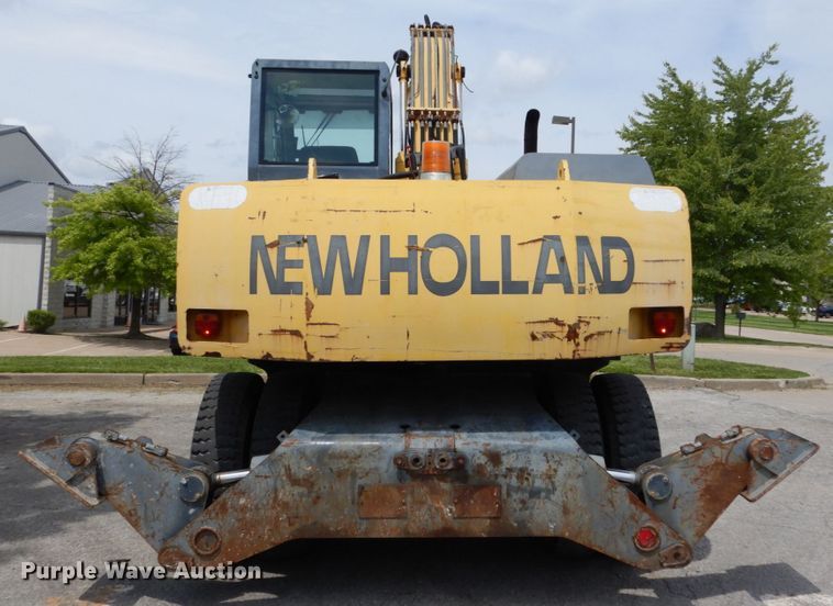 image for item GV9013 2000 New Holland EW160  rubber tire excavator