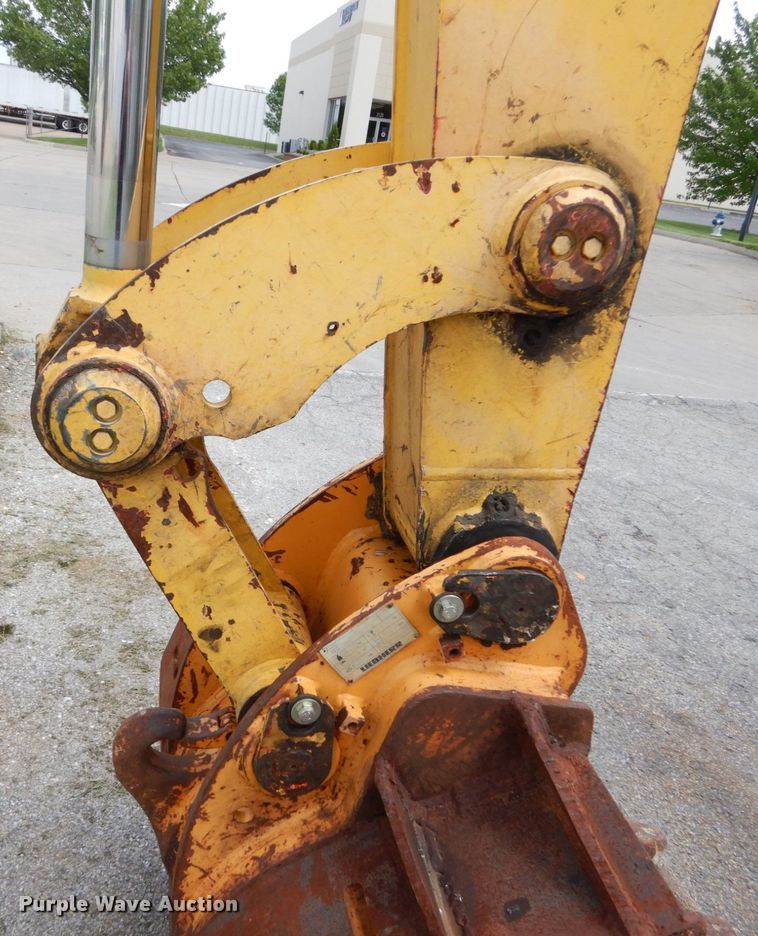 image for item GV9013 2000 New Holland EW160  rubber tire excavator