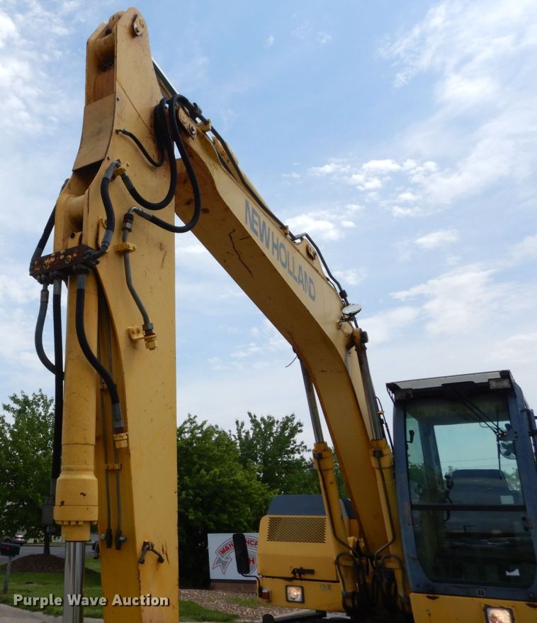 image for item GV9013 2000 New Holland EW160  rubber tire excavator