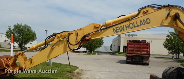 image for item GV9013 2000 New Holland EW160  rubber tire excavator