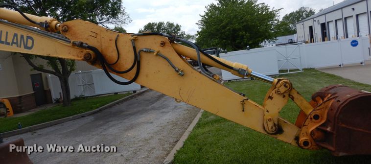 image for item GV9013 2000 New Holland EW160  rubber tire excavator