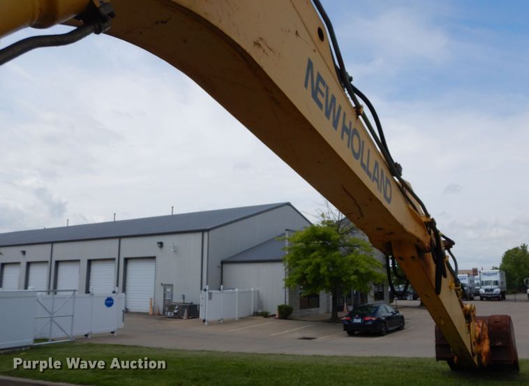 image for item GV9013 2000 New Holland EW160  rubber tire excavator