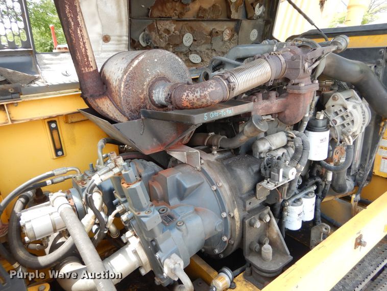 image for item GV9013 2000 New Holland EW160  rubber tire excavator