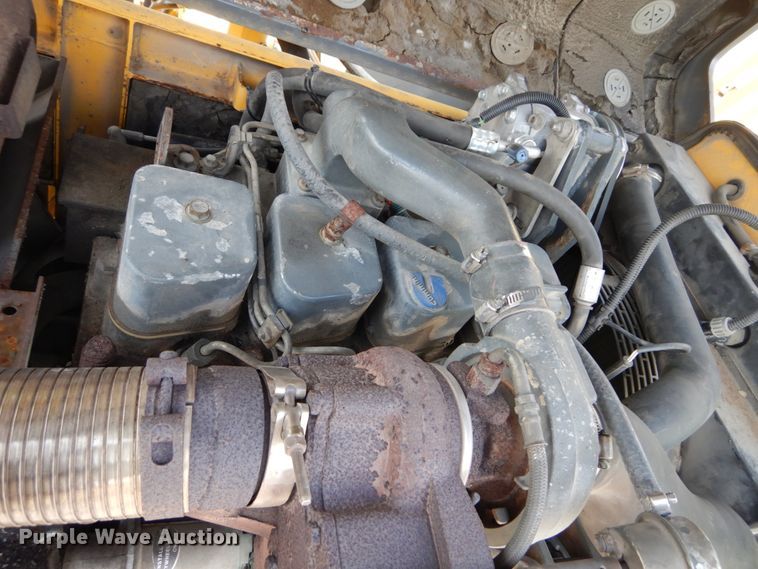 image for item GV9013 2000 New Holland EW160  rubber tire excavator