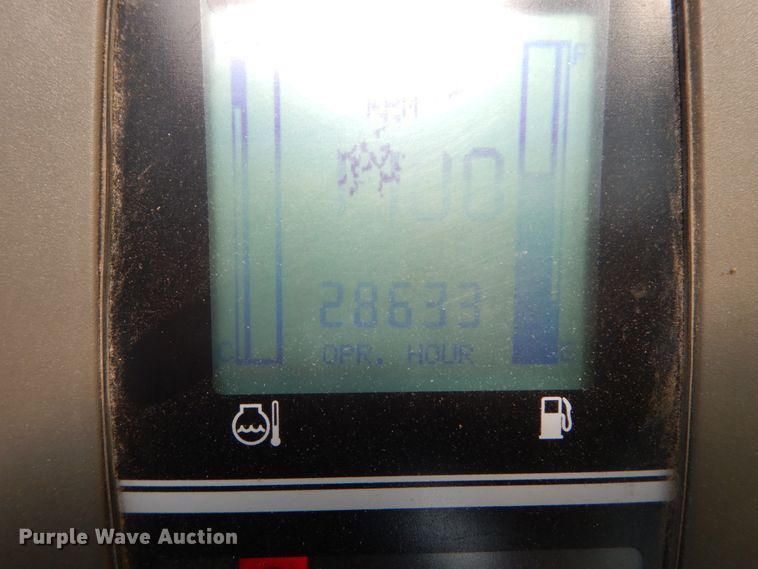 image for item GV9013 2000 New Holland EW160  rubber tire excavator