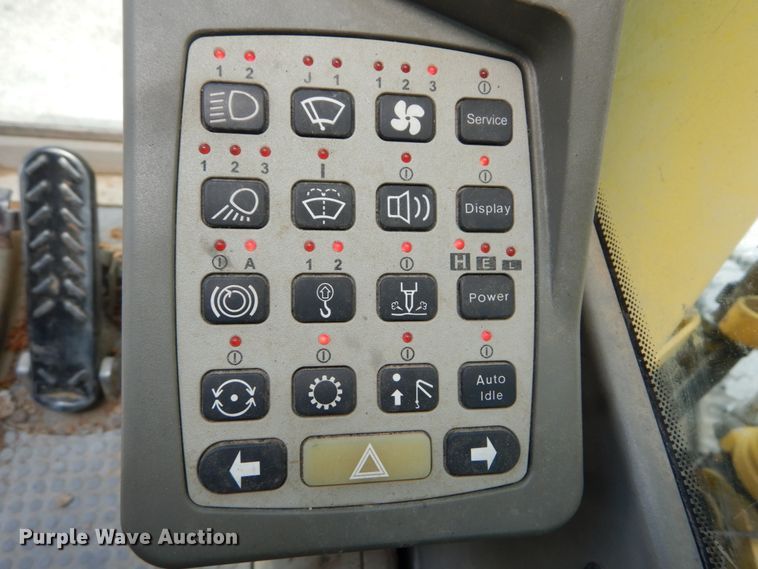 image for item GV9013 2000 New Holland EW160  rubber tire excavator