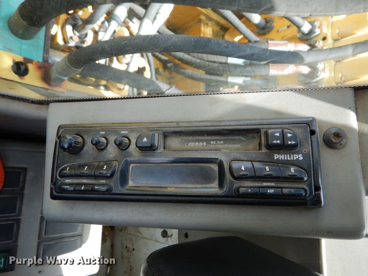 image for item GV9013 2000 New Holland EW160  rubber tire excavator