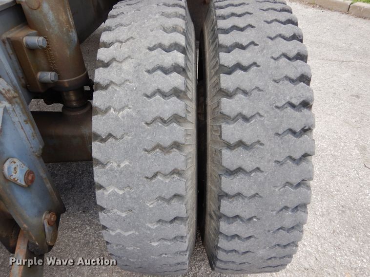 image for item GV9013 2000 New Holland EW160  rubber tire excavator