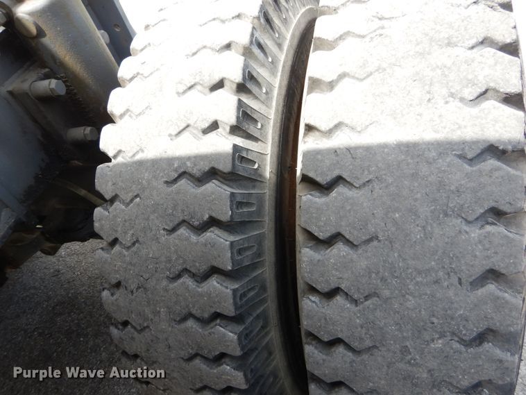 image for item GV9013 2000 New Holland EW160  rubber tire excavator