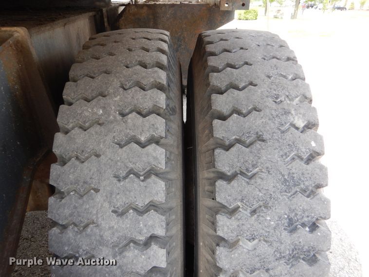 image for item GV9013 2000 New Holland EW160  rubber tire excavator