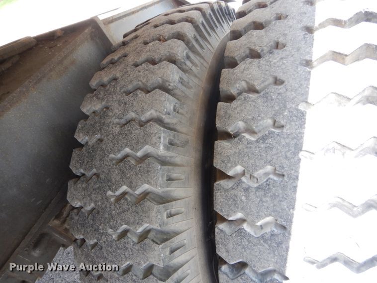 image for item GV9013 2000 New Holland EW160  rubber tire excavator