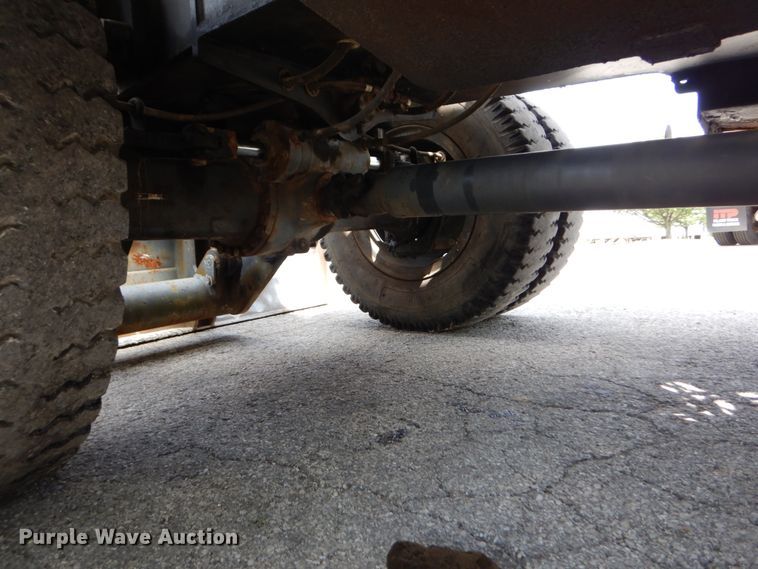 image for item GV9013 2000 New Holland EW160  rubber tire excavator