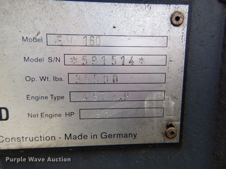 image for item GV9013 2000 New Holland EW160  rubber tire excavator