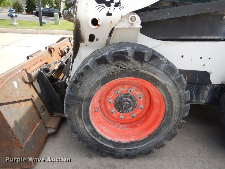 image for item GV9015 2014 Bobcat S590  skid steer loader